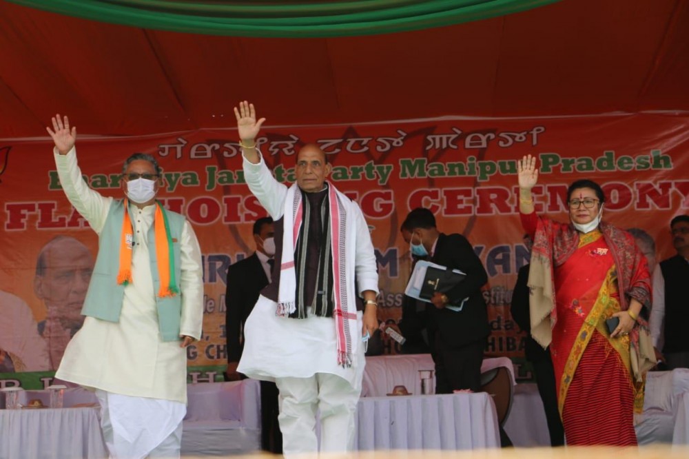 Union Defence Minister Rajnath Singh and others during the flag hoisting ceremony on February 14. (NNN Photo)